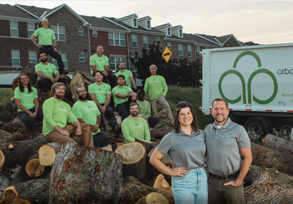Alt text: Arbor Aesthetics brand feature describing the company&rsquo;s expert tree care in Omaha since 2005, its focus on meaningful growth for people and trees, and quotes from owners Amy and Jeff Grewe.